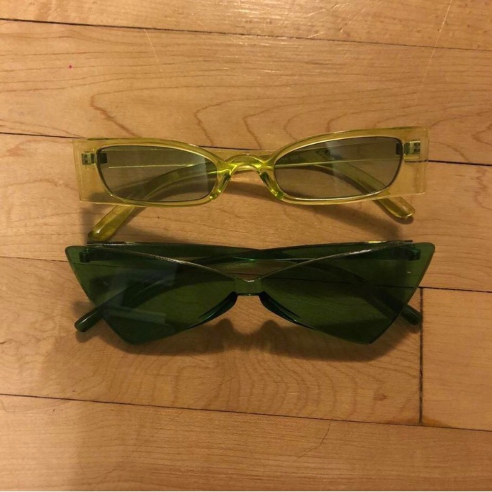 two pairs of green glasses